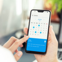phone with calendar scheduling a demo with Cuvrd