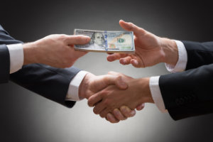 handshake with money