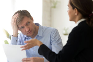 stressed out customer talking to salesperson